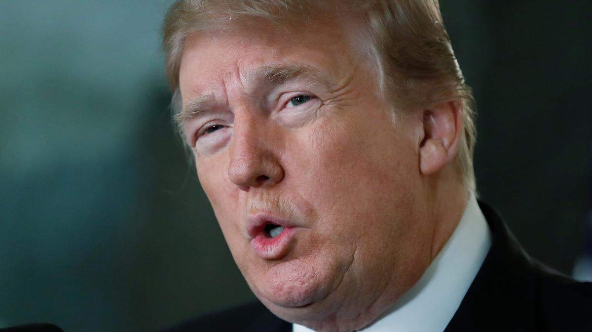 FILE -- In this Feb. 15, 2018 photo, President Donald Trump speaks in the Diplomatic Room at the White House, in Washington, about the tragic school shooting in Parkland, Fla.