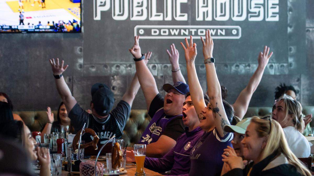 Sacramento Kings fans cheer as forward Keegan Murray makes a 3-pointer at the end of the first half on Sunday, April 23, 2023, at Public House Downtown in Sacramento.