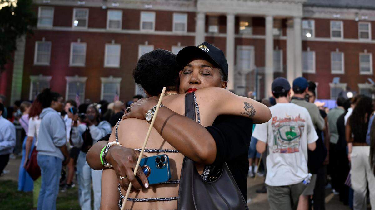 Supporters of United States Vice President Kamala Harris, the 2024 Democratic Party nominee for president, console each other as she makes a statement conceding the election to Donald Trump at Howard University in Washington, D.C,. on Nov. 6.