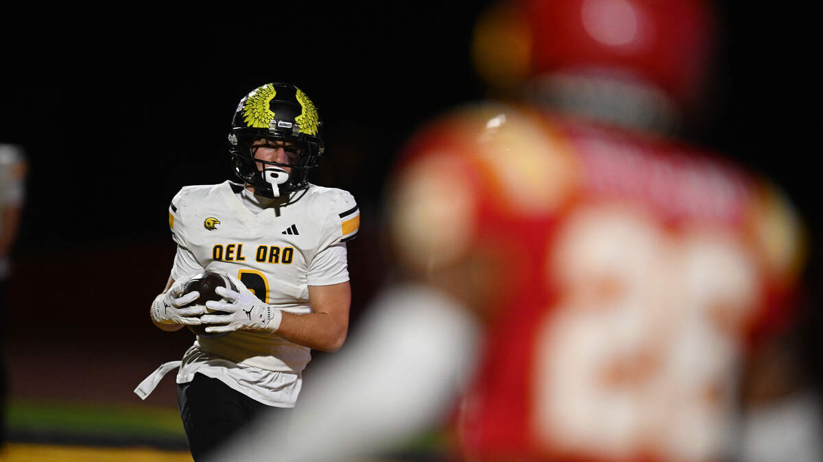 Brennen Gibbs (3) of the Del Oro Golden Eagles makes a touchdown catch in the first half against the Jesuit Marauders on Friday, Oct. 17, 2025, in Carmichael.