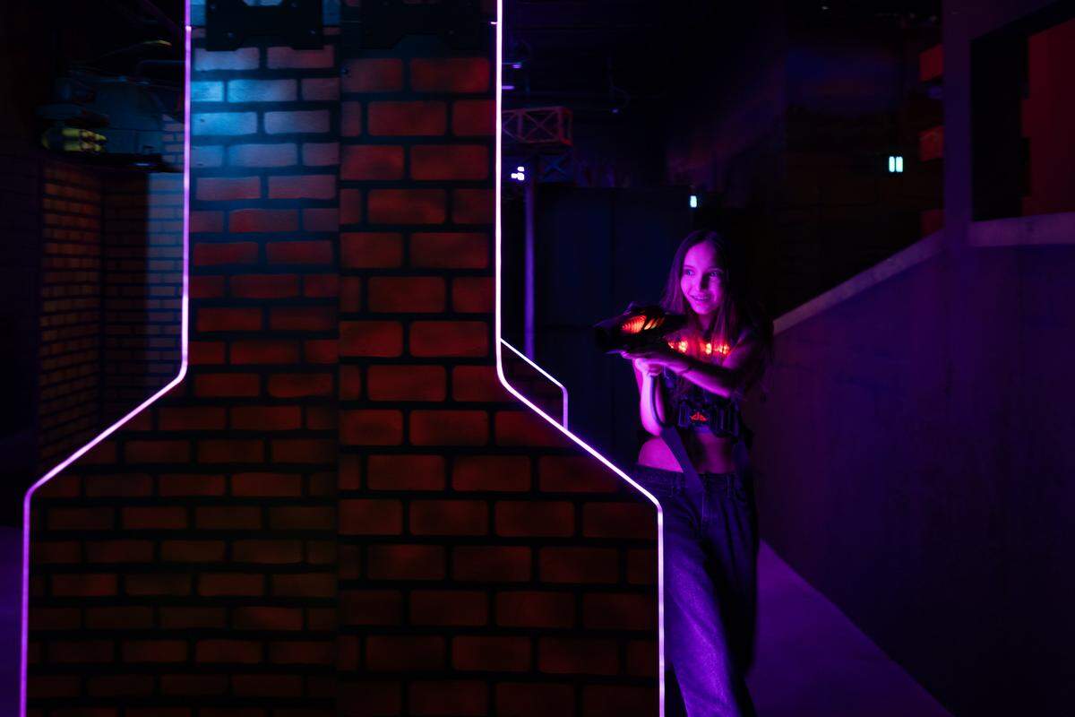 Juli Maurizio plays laser tag at the BLVD in West Sacramento on Wednesday, Aug. 6, 2025.