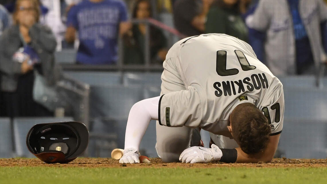Phillies' Rhys Hoskins enduring painful season. Another Jesuit grad seeks majors return