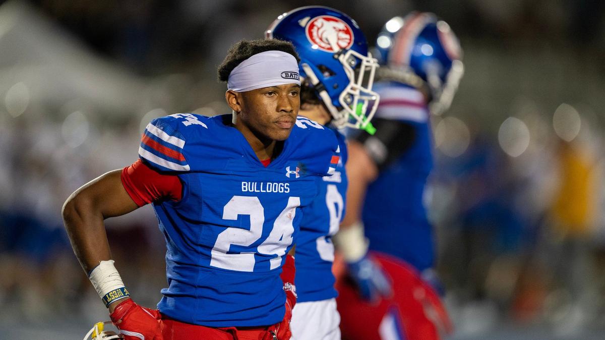 Folsom Bulldog safety Kam Totton (24) leaves the field after Serra’s Brody Smith (88) made the go-ahead field goal on Friday at Folsom High School.