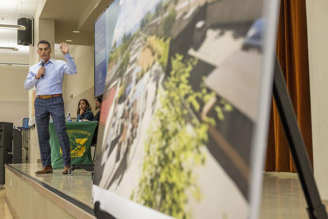Brian Pedro, director of Sacramento's Department of Community Response, speaks to residents during a community meeting at Witter Ranch Elementary School about a future homeless micro-community in North Natomas on Monday.