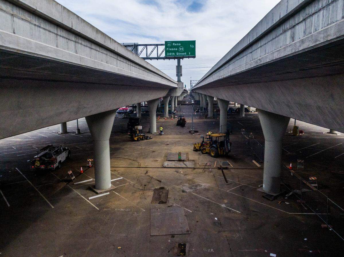 Constriction workers continue on the project under the W/X freeway in Sacramento on Monday, March 22, 2021.