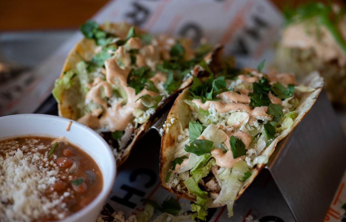 Chicken tacos sit on a plate at Char Market in Carmichael on Thursday, Aug. 28, 2024.