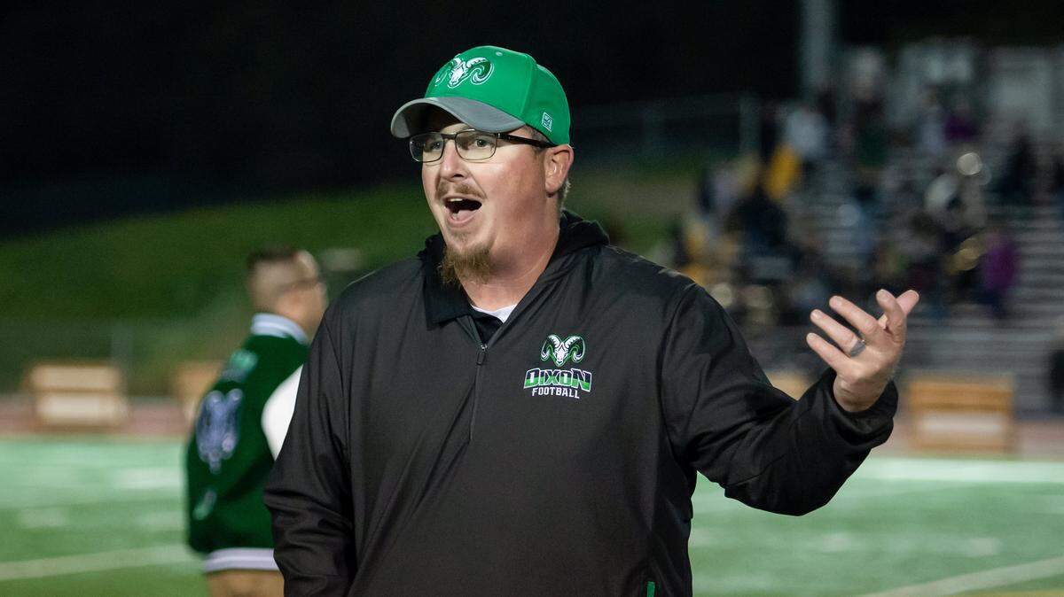 Dixon Rams coach Wes Besseghini talks with his team after a game on Oct. 28, 2022.