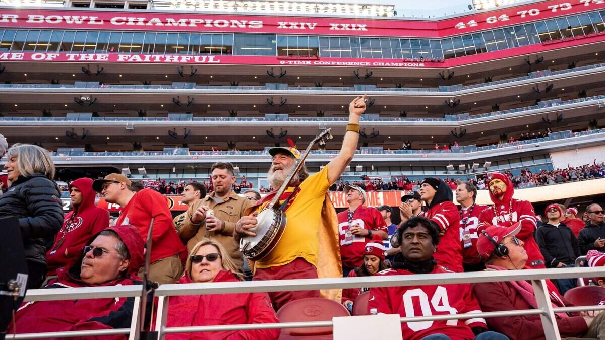 Stacy Stuart Samuels, more commonly known as Banjo Man by fellow San Francisco 49ers fans, cheers as 49ers take on the Minnesota Vikings during the NFC playoff game Saturday, Jan. 11, 2020, at Levi’s Stadium in Santa Clara. The 49ers beat the Vikings 27-10.