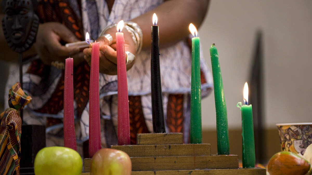 The forth candle as part of the fourth day of Kwanzaa celebration at the Oak Park Community Center.