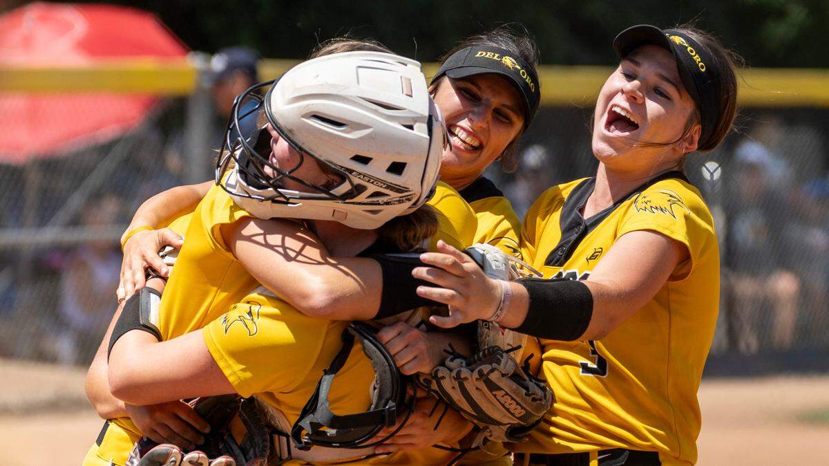 The Del Oro Golden Eagles celebrate after winning the CIF Northern California Division I softball championship against the Oak Ridge Trojans on Saturday in El Dorado Hills.