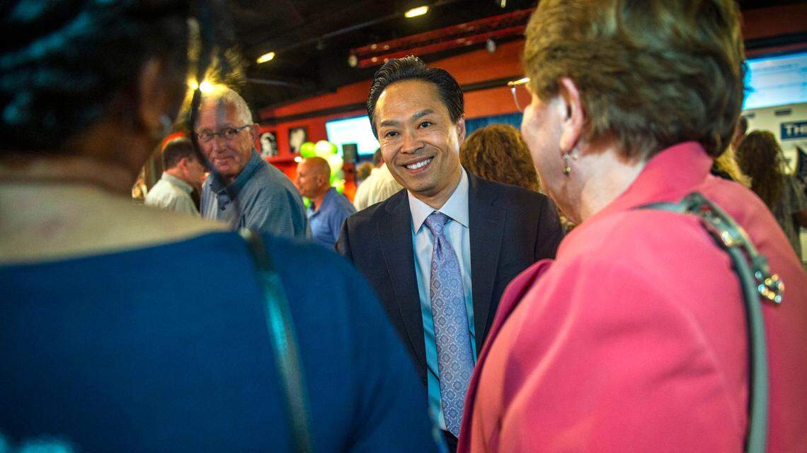 Sacramento District Attorney candidate Thien Ho celebrates his lead in early returns with supporters at his election party on Tuesday, June 7, 2022 at Rock & Brews Restaurant in Sacramento.