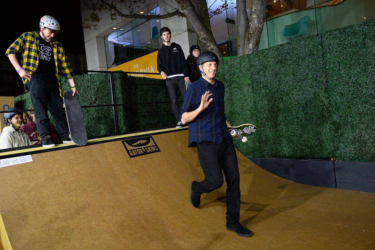 12. Skateboard pioneer Tony Hawk reacts after he trying the half-pipe on the red carpet walk at the 13th annual California Hall of Fame ceremony at the California Museum on Tuesday, Dec. 10, 2019 in Sacramento.