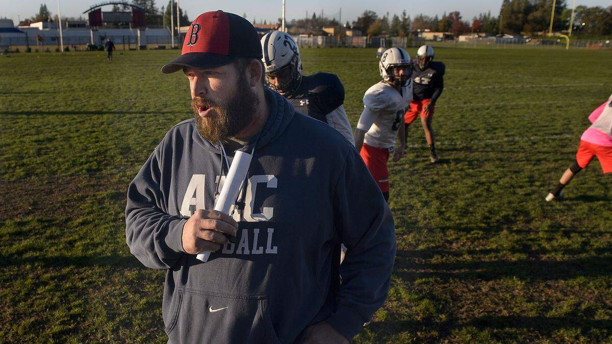 Coach Jon Osterhout during a football practice at American River College in Sacramento in December 2016.