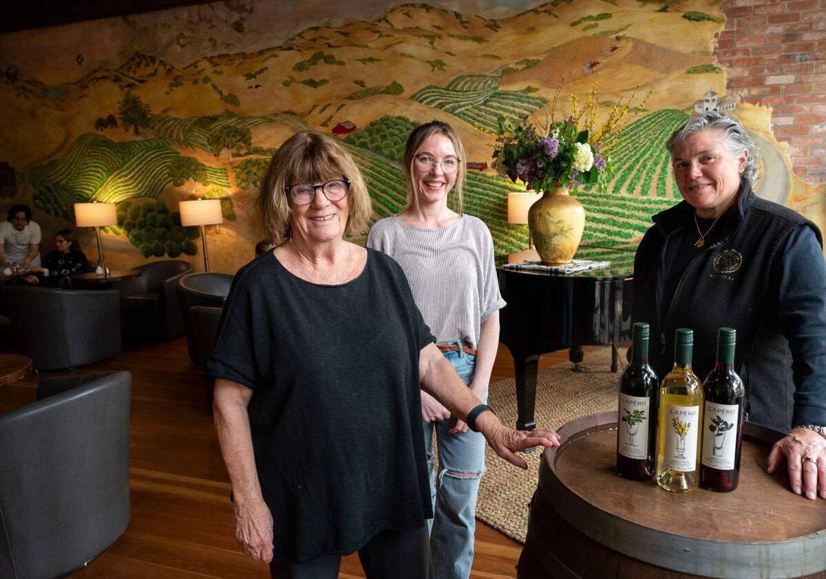 Georgeanne Brennan, left, Nicole Salengo-Lee, center and Corinne Martinez, are co-owners of L’Apéro Les Trois, California’s first French farmhouse-style apéritif tasting cafe in Winters on April 4, 2024.
