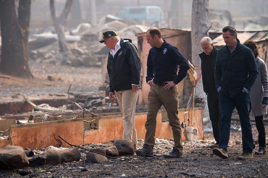President Donald Trump, FEMA Director Brock Long, Gov. Jerry Brown, Gov.-elect Gavin Newson and Paradise Mayor Jody Jones tour the Skyway Villa Mobile Home and RV Park during Trump’s visit to the Camp Fire scene in Paradise. FEMA could bring in 2,000 trailers to provide temporary housing.