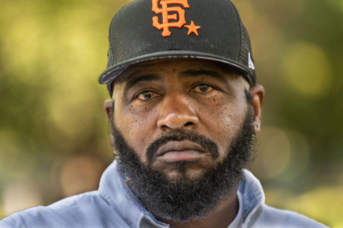 John Johnson, 54, of Los Angeles, talks about his support of Senate Bill 94 on Aug. 23. Johnson killed a woman in a 1989 car crash during a police chase. Johnson and the victim’s sister have reconciled and are supporting the passage of SB 94.