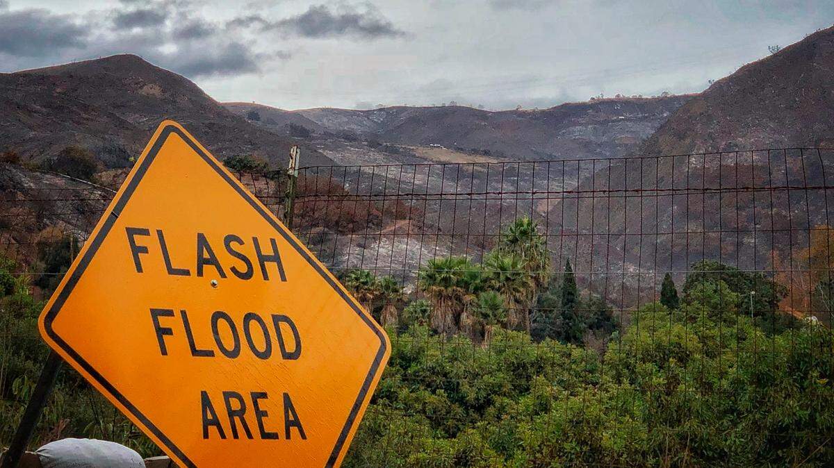Rescue personnel had to evacuate dozens of families from a California campsite with a boat, officials said.
