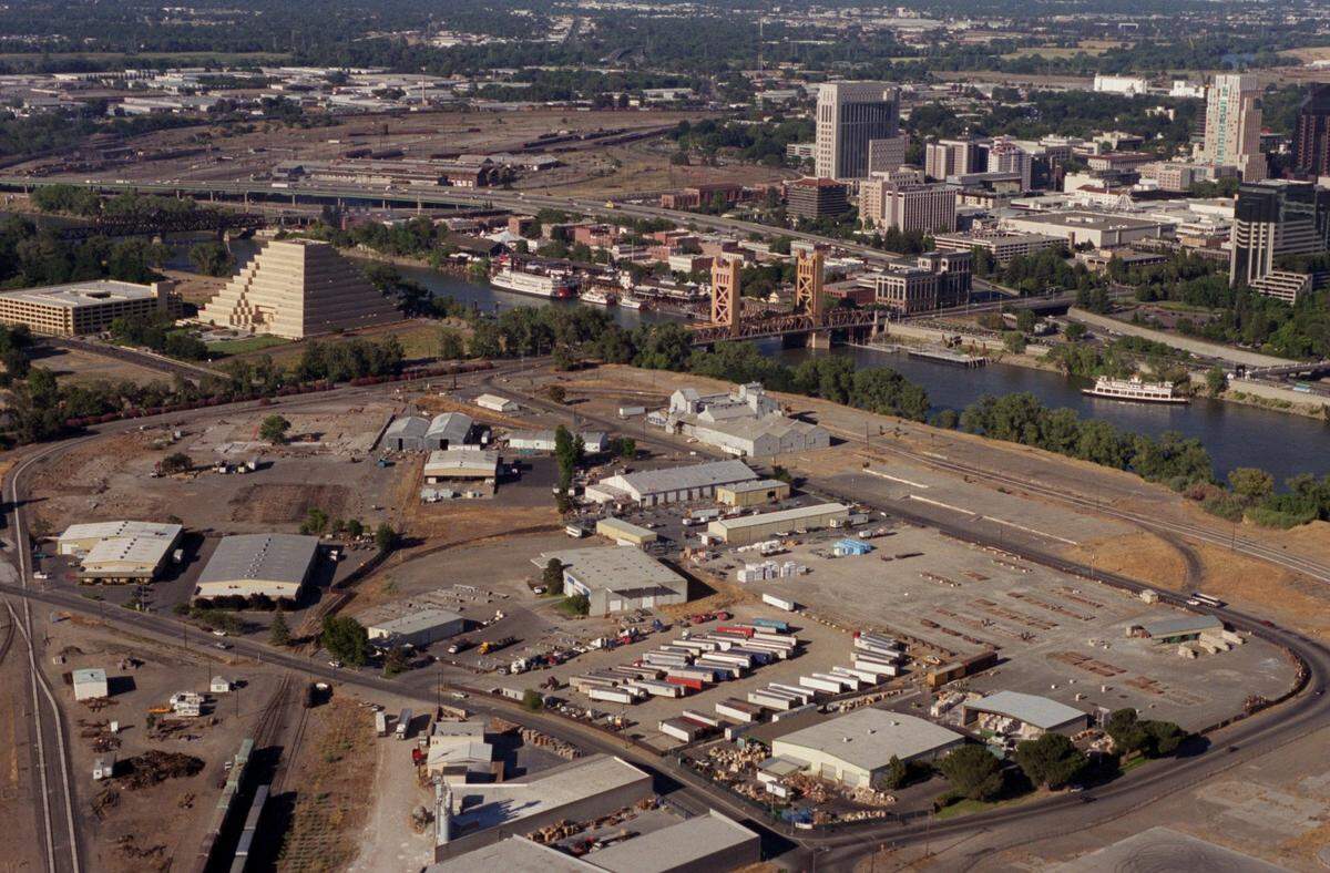 West Sacramento’s Bridge District was an industrial area bisected by a number of rail tracks in 1999, before the construction of the baseball stadium now known as Sutter Health Park.