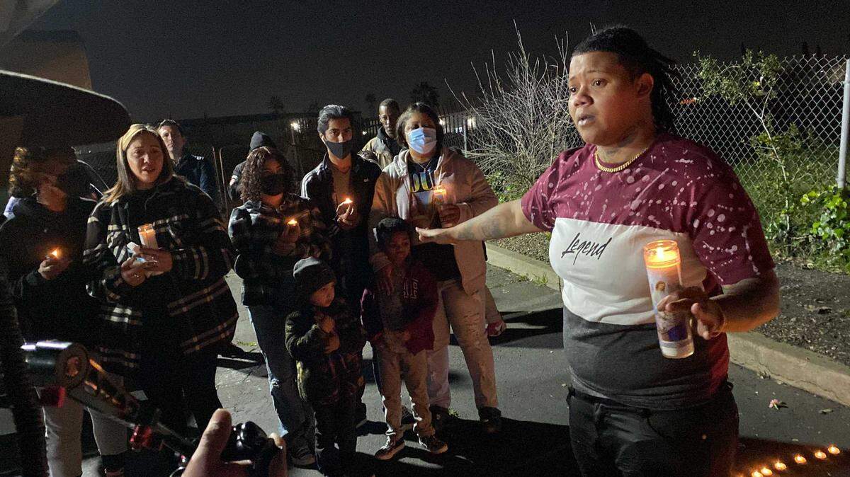 Courtnie Chung speaks on Thursday Jan. 20, 2022, at a candlelight vigil for her cousin, Alynia Asiah Lawrence, who was killed in a shooting on Jan. 13, 2022, while sitting in a car in a parking lot on Stockton Boulevard in Sacramento, California.