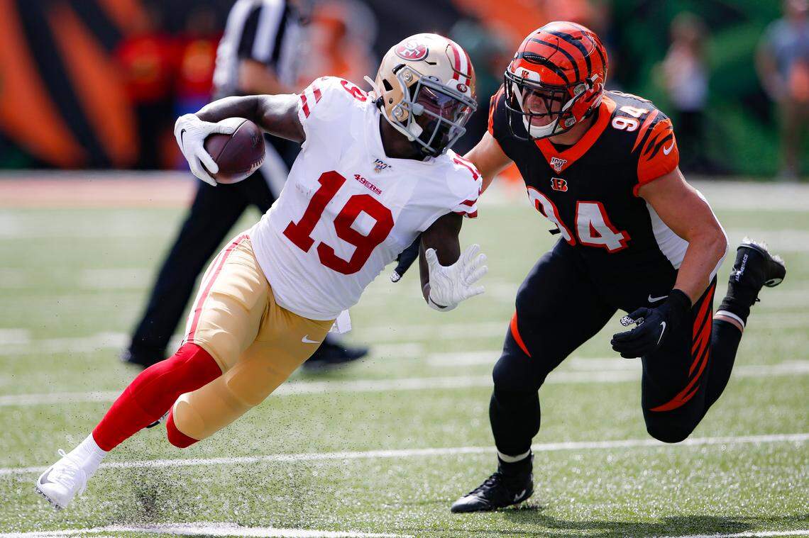 San Francisco 49ers wide receiver Deebo Samuel (19) runs against Cincinnati Bengals defensive end Sam Hubbard (94) during the first half an NFL football game, Sunday, Sept. 15, 2019, in Cincinnati. (AP Photo/Gary Landers)