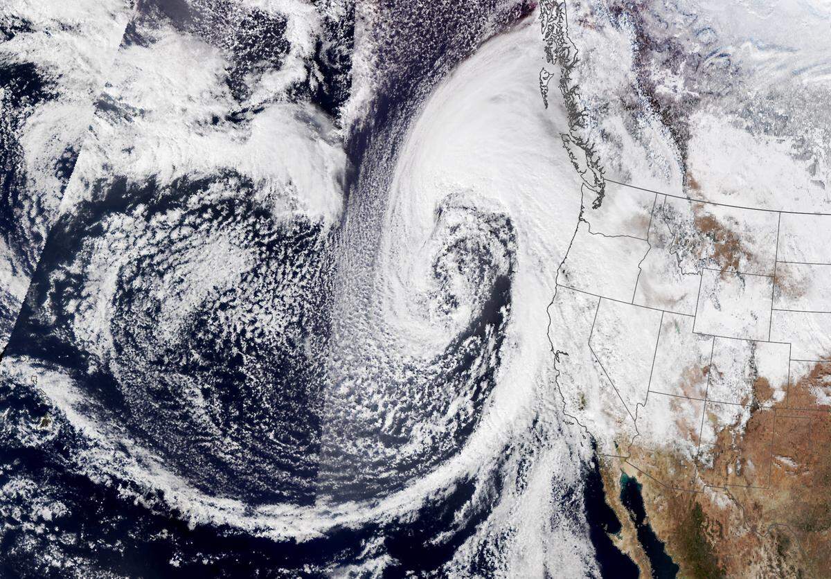 A Jan. 4 satellite image shows an atmospheric river moisture plume from the tropical Pacific Ocean interacting with a low-pressure system over the northeast Pacific, bringing the sequence of storms to California. Atmospheric rivers can bring up to 50% of the precipitation that falls in the western United States, according to NASA.