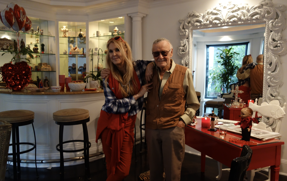 In 2015, JC Lee stands with her father, Marvel Comics creator Stan Lee, in the Los Angeles home for sale for $8.8 million.