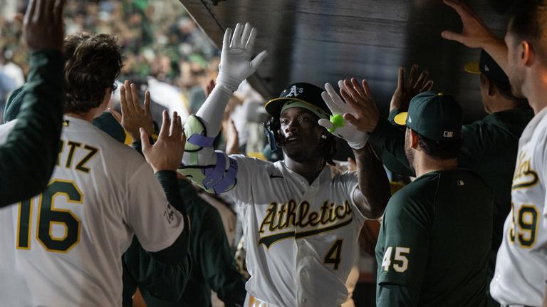 Photos: A’s slugfest buries Astros 11-4 in 2026 home opener