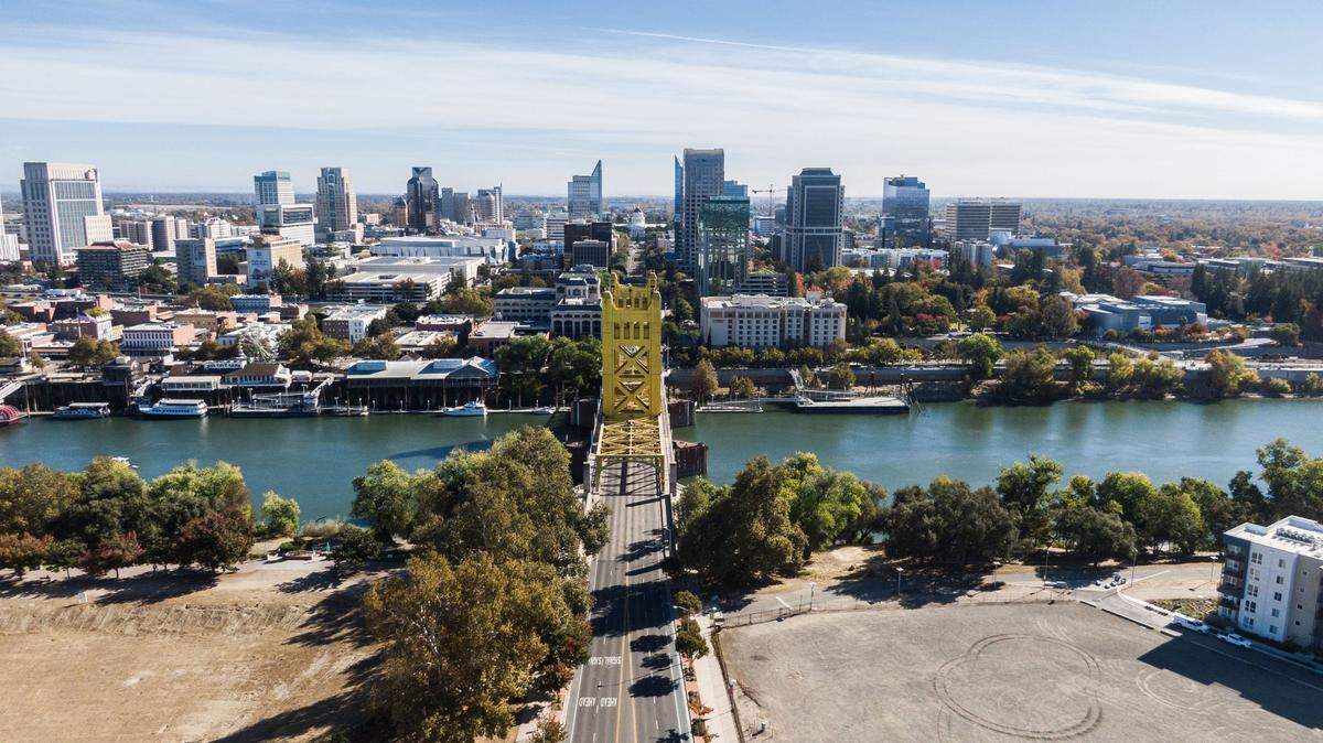 A drone view from West Sacramento shows one end of the newly named Cabaldon Parkway, formerly the Tower Bridge Gateway, on Wednesday, Nov. 6, 2024.