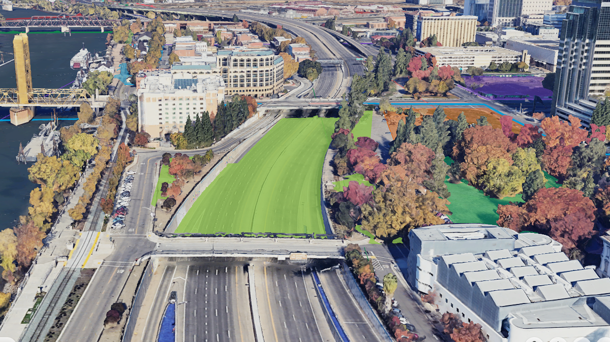 A rendering shows the proposed Stitch Park Riverfront Reconnection Project, which would build a roughly two-block-long park over Interstate 5, connecting downtown Sacramento to the riverfront. 