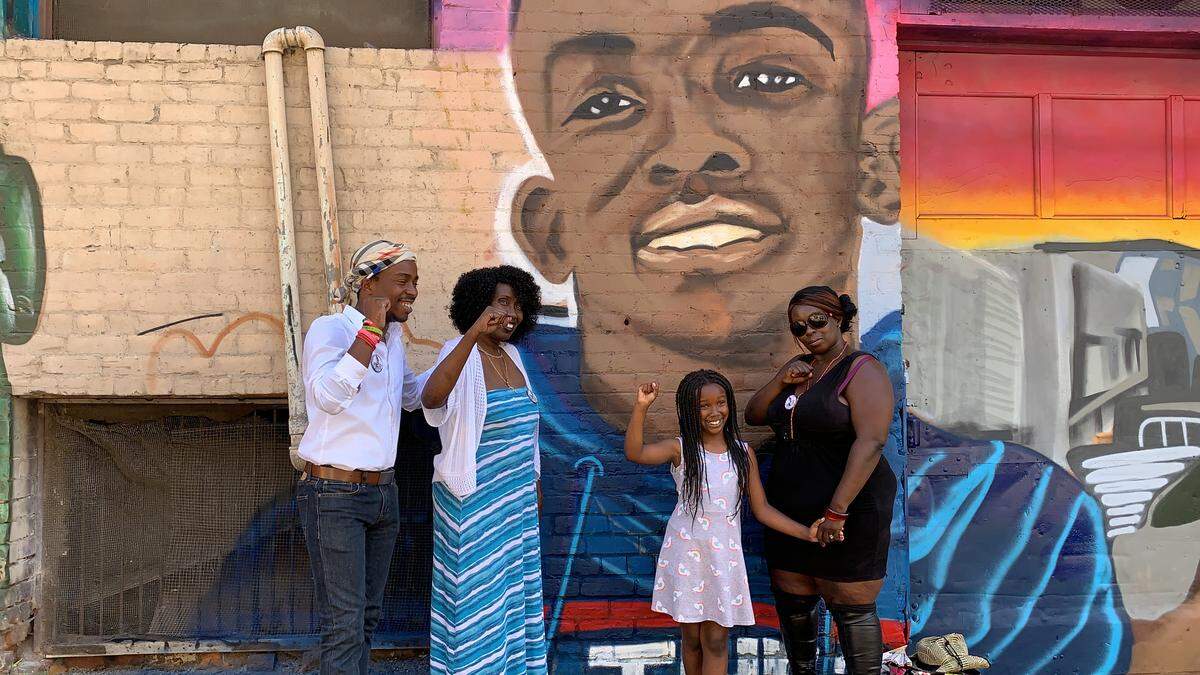 Stephon Clark’s, from left, brother Stevante Clark, grandmother Sequita Thompon, sister Cailyn Clark and mother Se’Quette Clark visit ACLU-funded mural by local artist A.J. Kute on June 20, 2019. The mural is located on Improv Alley, between 7th and 8th street, Meadowview, as part of the Wide Open Walls Mural Festival.