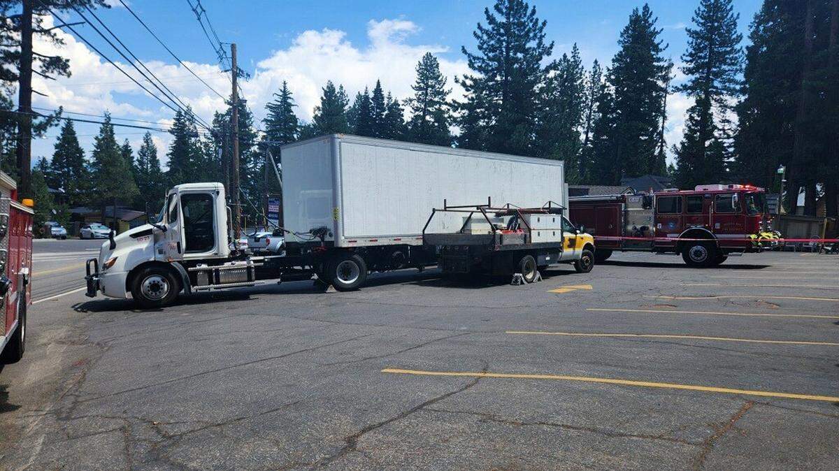 A man died Monday after being pinned between a Ford F-450 pickup and tractor-trailer in a parking lot in Tahoma, California Highway Patrol officials said.