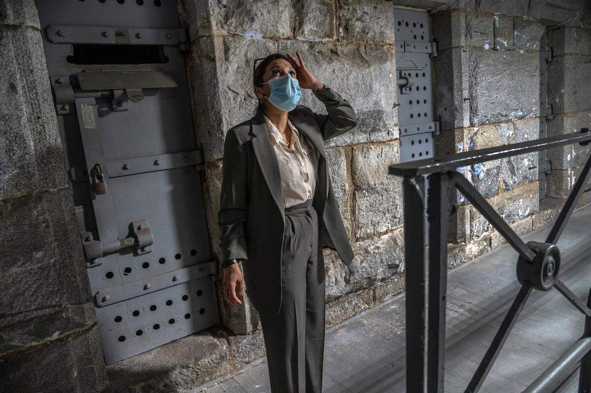 Norma Cumpian looks up at windows that are rumored to have been built to let the spirits escape as she tours the former death row at Folsom State Prison in April. Between 1895 and 1937, 93 prisoners were hanged at Folsom.