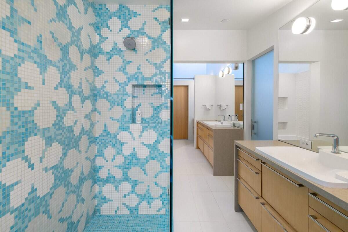 Retro-inspired tile brings one of the bathrooms to life.