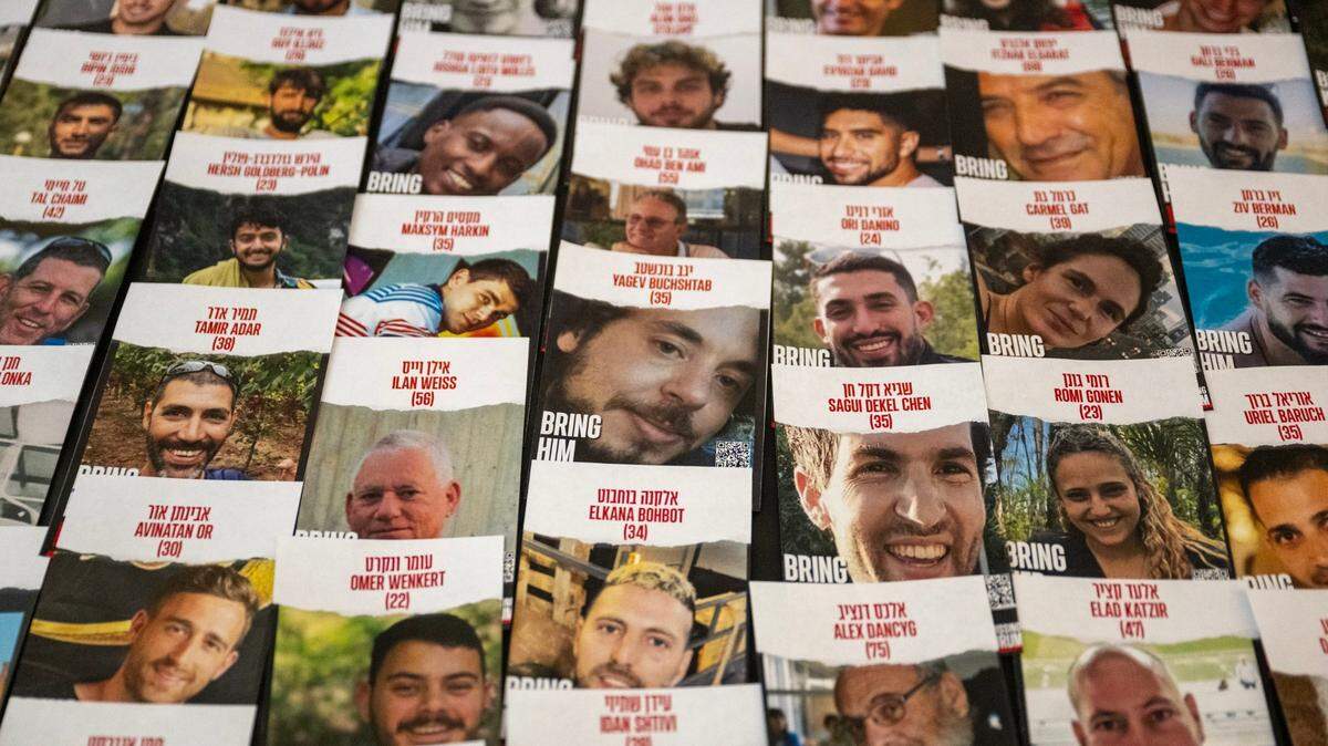 Orit Izilov placed photographs of Israelis kidnapped by Hamas on October 7th last year in the new Jewish Life and Resource Center at Sacramento State University on Wednesday, May 8, 2024 in Sacramento.