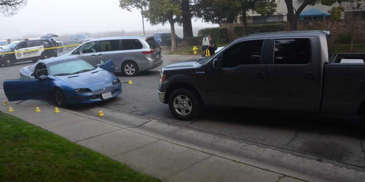 Sacramento County Sheriff’s investigators work Saturday, Jan. 16, 2021, at the scene of an officer-involved shooting the night before in Carmichael, Calif. Sheriff’s officials have released few details about the incident; none of the deputies involved had body warn or dashcam video of the incident.