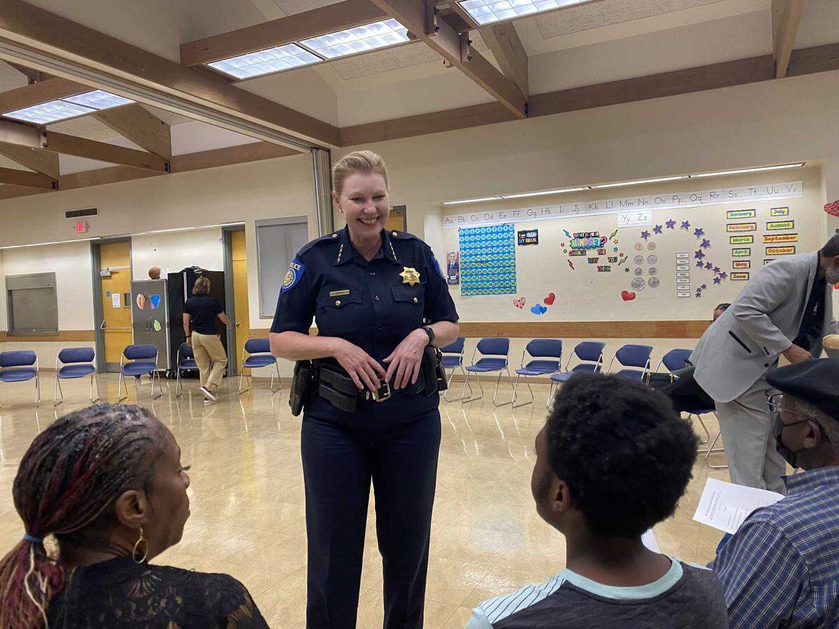 Sacramento Police Chief Kathy Lester speaks with residents about summer crime prevention efforts during a community meeting at the Oak Park Community Center in June 2024.