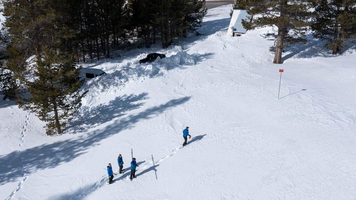 California Department of water resources conducts second snow survey of the season at Phillips Station on Wednesday, Feb. 2, 2023. Water Supply Forecasting Unit Manager Sean de Guzman leads staff during the snow survey.