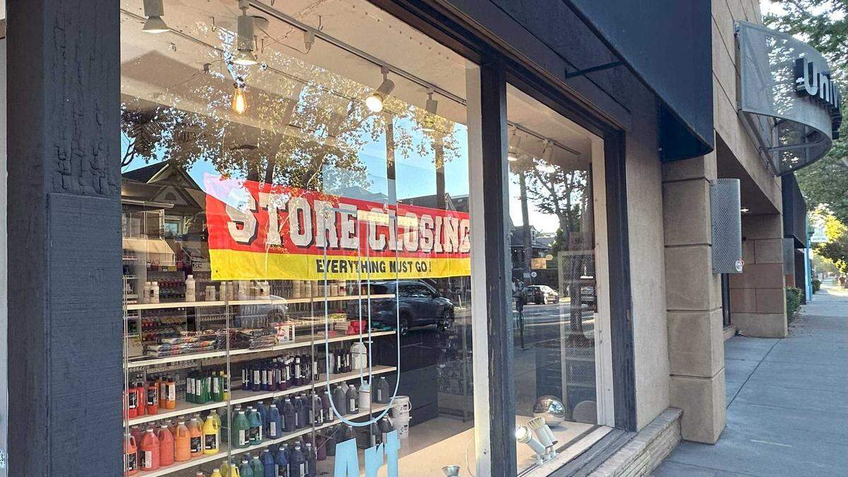 Sale signs adorn the windows of University Art at 26th and J Street on Friday, Oct. 4, 2024. The longtime art store, which took over Taylor’s Art Store in 1998, is closing. The building had been an art and framing store since Van’s Art Shop was started in 1957. The owners of University Arts are also selling the midtown properties.