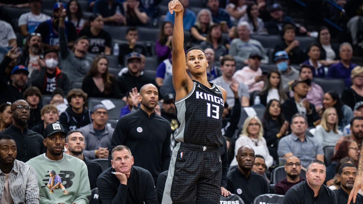 Sacramento Kings forward Keegan Murray (13) follows through on scoring a three point basket against the Los Angeles Clippers during the first half of the NBA basketball game Saturday, Oct. 22, 2022, at Golden 1 Center in Sacramento.