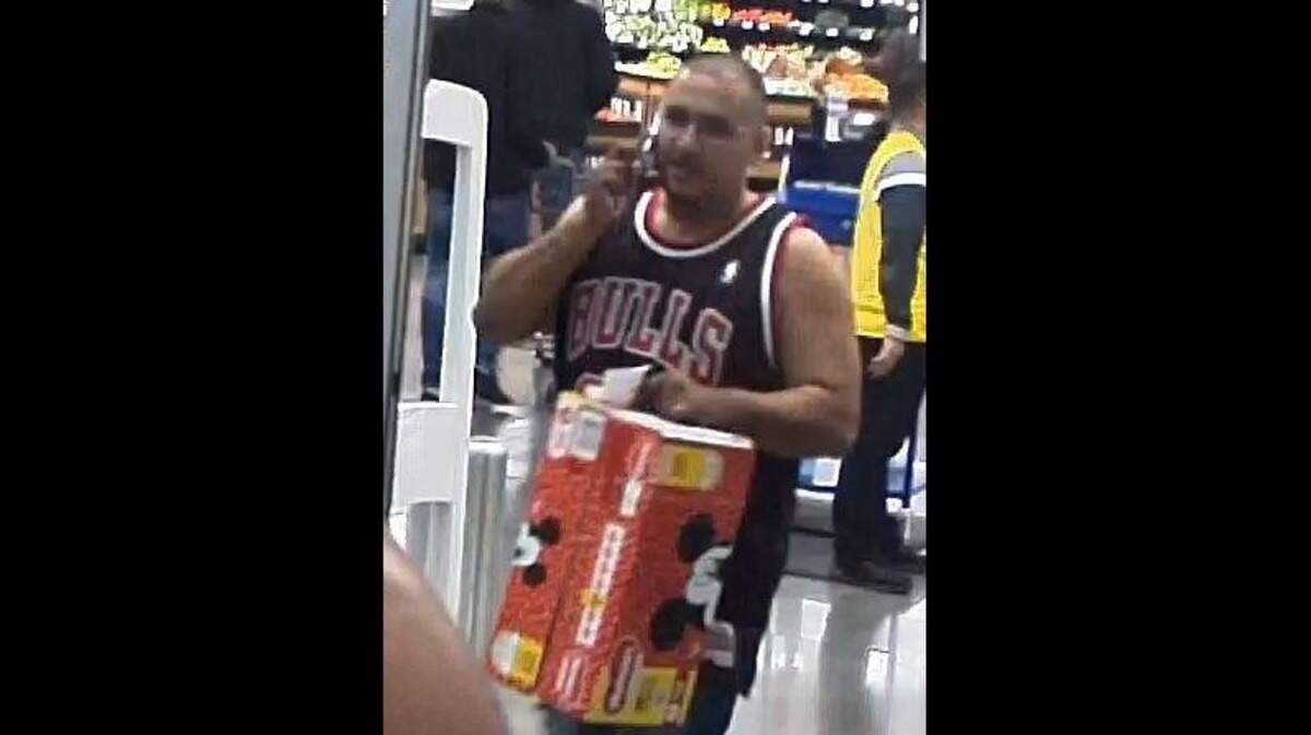 A suspect sought in connection with using a credit card stolen from a purse in the trunk of a victim’s car.