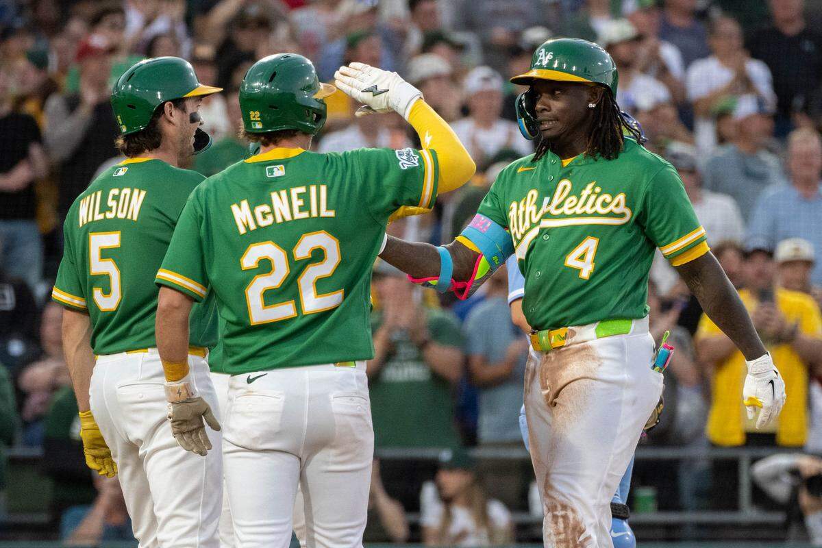 Athletics right fielder Lawrence Butler (4) is congratulated at home plate after his three run homer in the fourth inning during a game at Sutter Health Park on Wednesday.