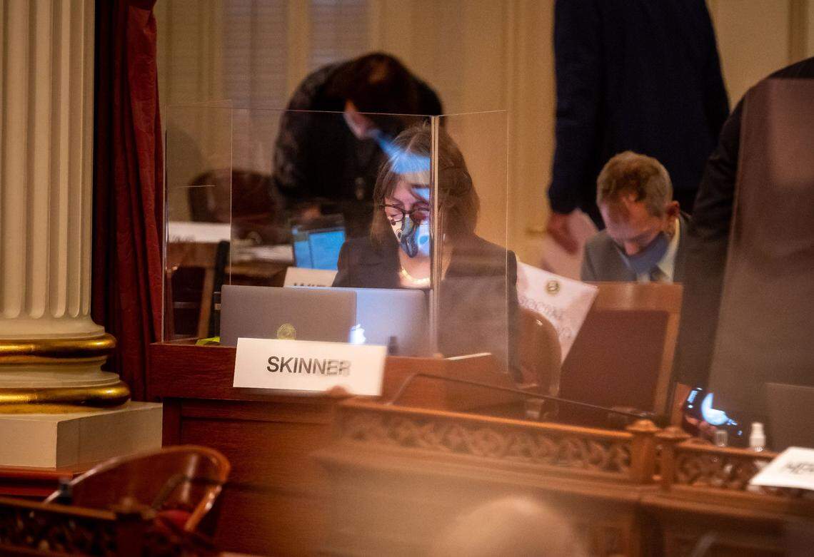 State Sen. Nancy Skinner, D-Berkeley, works on the last day of the California Legislature’s 2021 legislative session at the Capitol on Sept. 10. Skinner authored Senate Bill 65, dubbed the “Momnibus Act.”