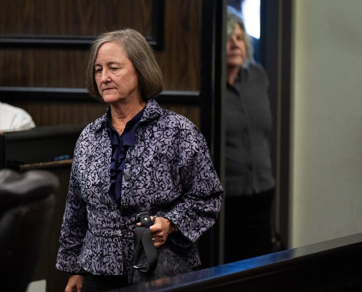 Administrator Cindy Keller, left, and principal Staranne Meyers of the now-closed Guiding Hands School walk back into a sentencing hearing at El Dorado Superior Court on Monday for the 2018 restraint death of a student Max Benson. The hearing was continued until Aug. 8.
