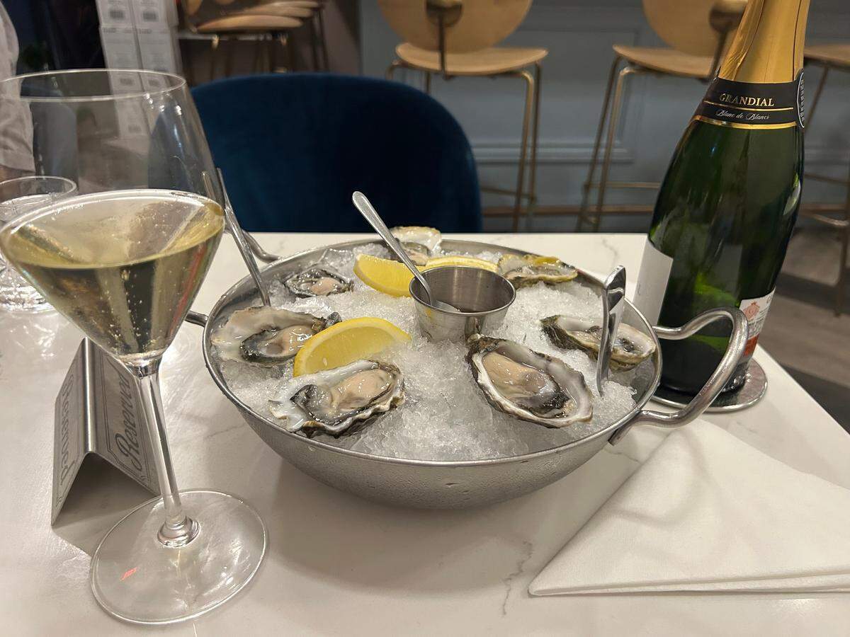 At Fizz Champagne & Bubbles Bar in Sacramento, a glass of French sparkling blanc de blanc cost $10 during happy hour while oysters in the half shell are $4 each.