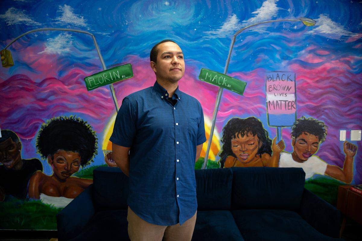 Duke Cooney talks about his candidacy for Sacramento County Supervisor District 2 on Thursday, July 8, 2021, in front of a mural at the Marsha P. Johnson Center, an extension of Sacramento LGBT Community Center, on Stockton Boulevard in Sacramento. If elected, Cooney would be the first openly LGBT member of that body.