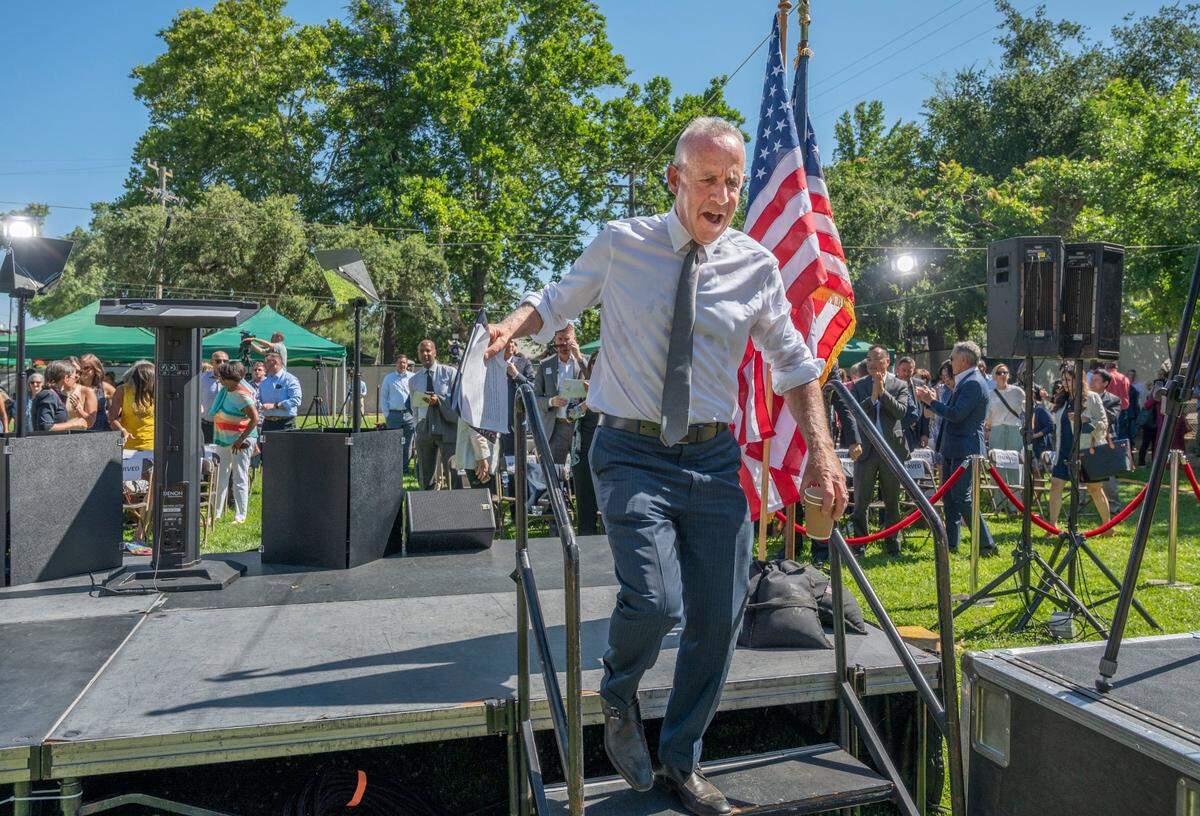 Sacramento Mayor Darrell Steinberg walks off the stage after he gave his State of the City speech at the YMCA in midtown Sacramento on Wednesday. Steinberg announced a plan for a $50 million major sports complex in Meadowview.
