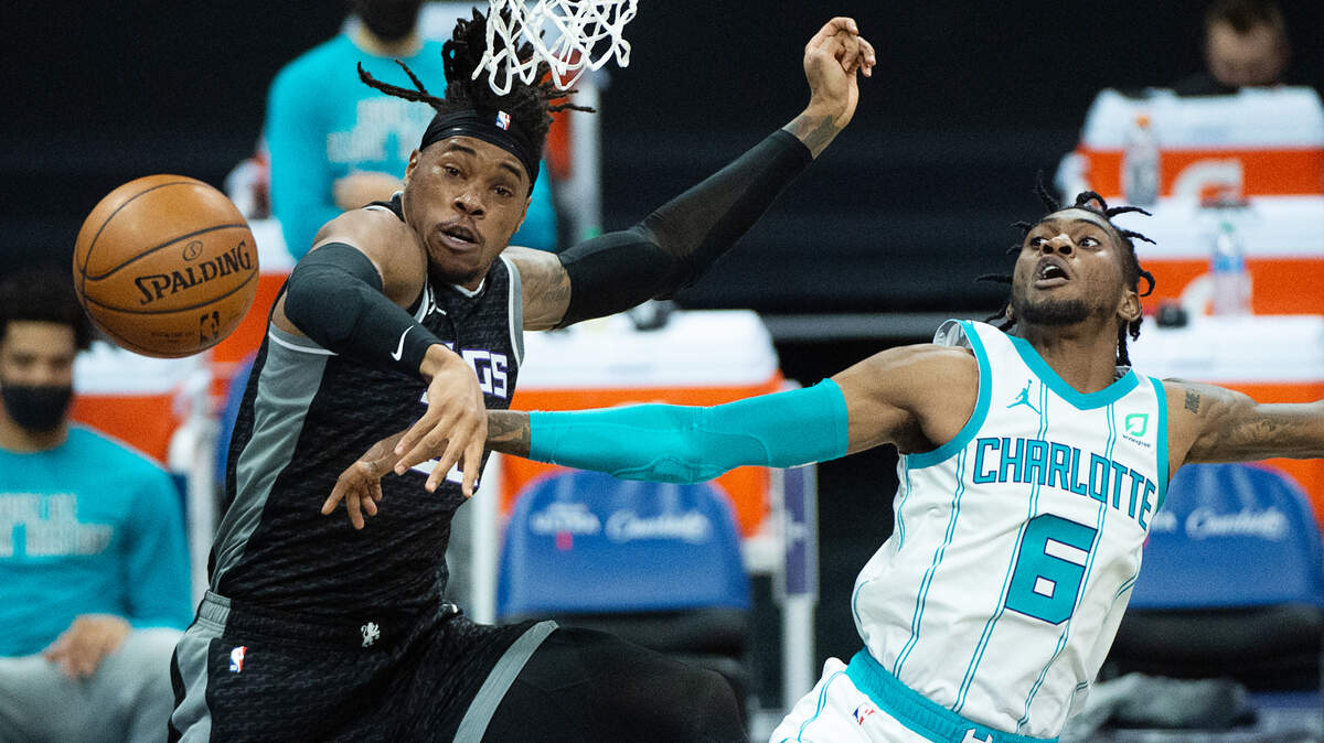 Sacramento Kings center Richaun Holmes (22) defends against Charlotte Hornets forward Jalen McDaniels (6) in the first quarter during a game at Golden 1 Center on Sunday, Feb. 28, 2021 in Sacramento.