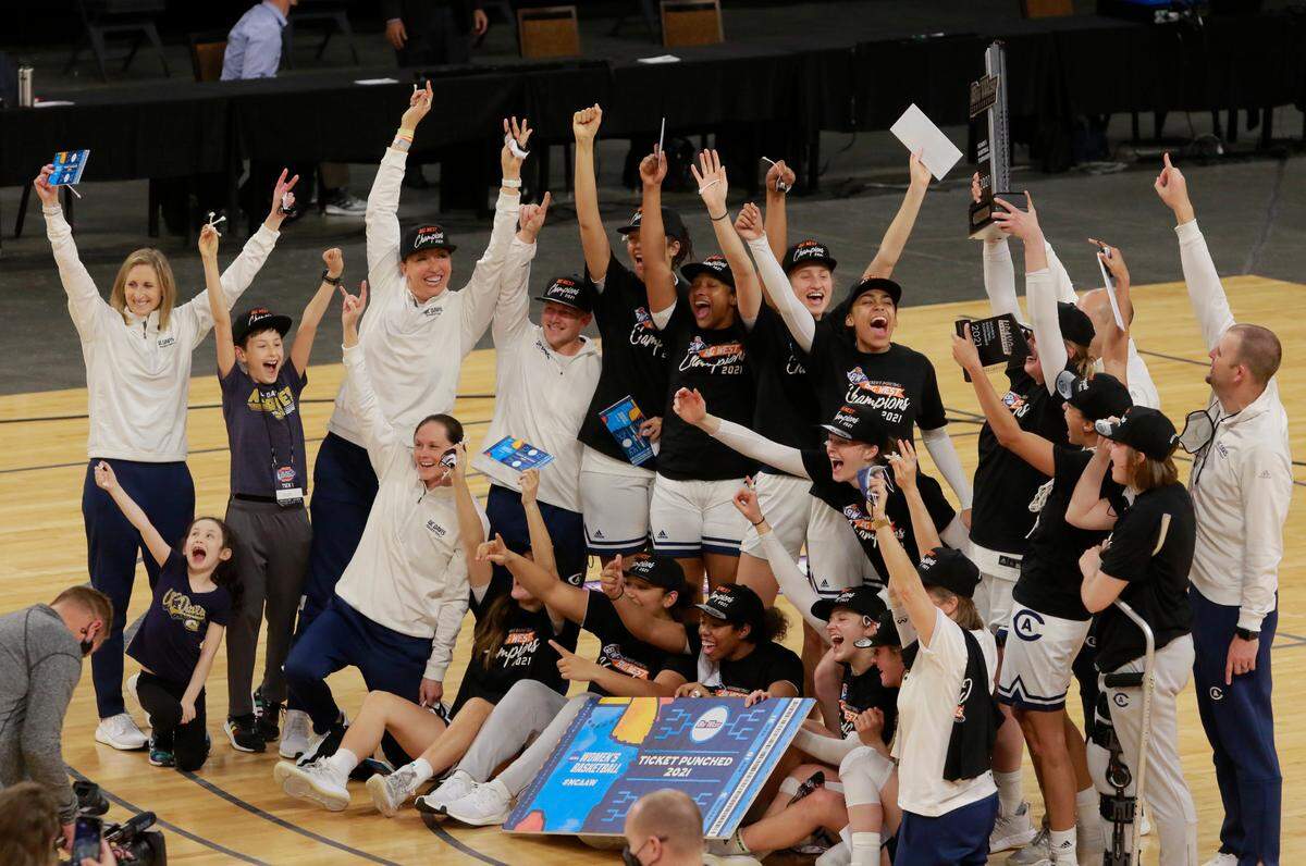 UC Davis players celebrate their NCAA Big West Conference tournament championship win over UC Irvine in Las Vegas in March. The victory led to a No. 12 seed in the Division I NCAA tournament.