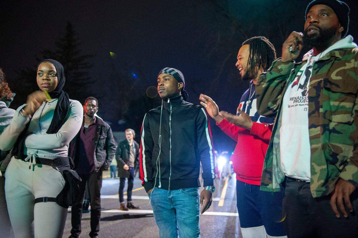 Stevante Clark marches with people protesting the DA’s decision not to charge the officers who shot and killed his bother Stephon Clark on Monday in East Sacramento.