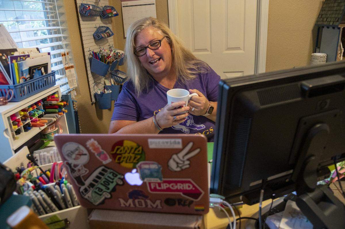 Kimberli Heck, a teacher at Winston Churchill Middle School in Carmichael, participates in a Zoom session with her students on Tuesday, May 12, 2020, during the coronavirus stay-at-home order. She doesn’t teach live she makes videos and lessons for her students to watch online. Then she follows up with them during office hours. “I just miss them and their quirkiness. I want to be back in the classroom,” Heck said.